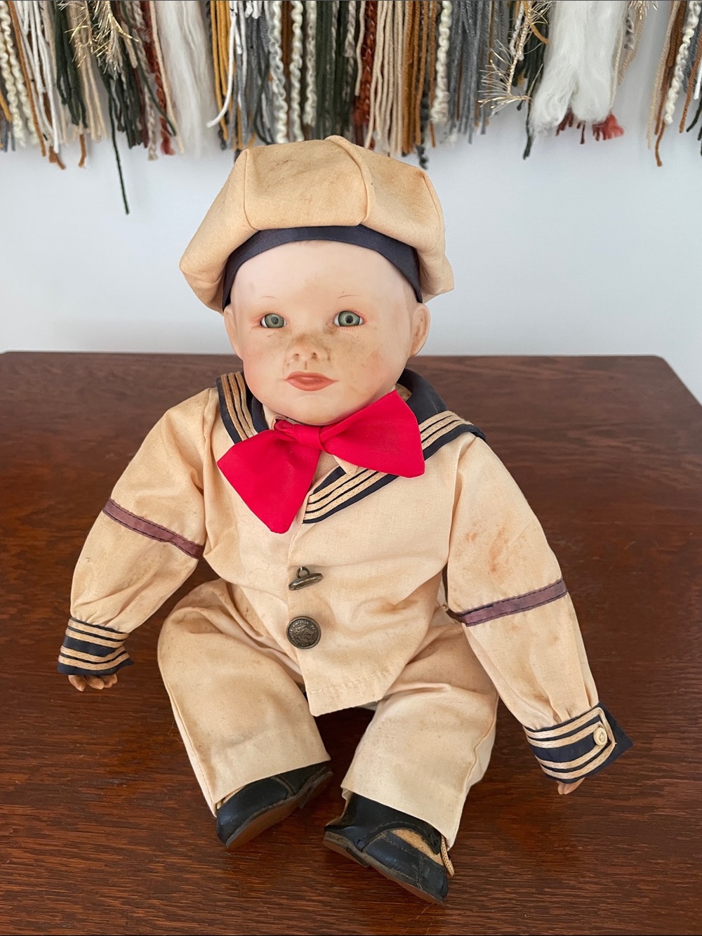 Porcelain Sailor Doll with Red Bow vintage worn
